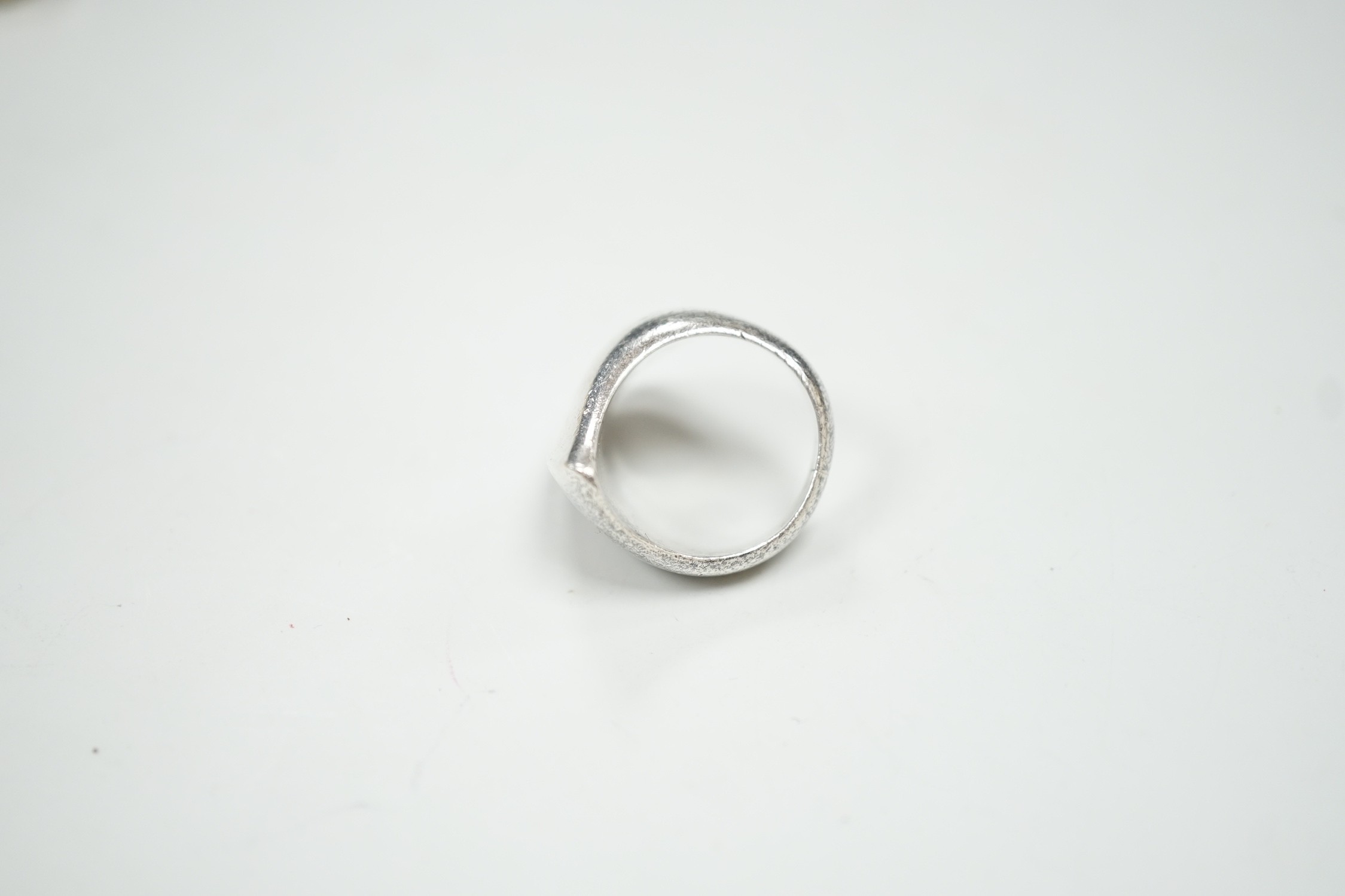 A 1960's Georg Jensen sterling silver dress ring, design no. 90, London import marks for 1966, size N/O.